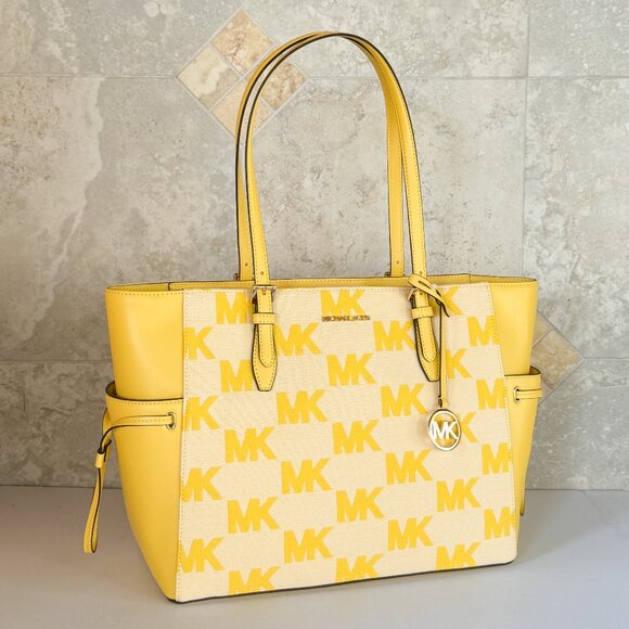 Michael Kors Gilly LG Drawstring Shoulder Tote Bag MK Graphic Logo Golden Yellow - Picture 3 of 15